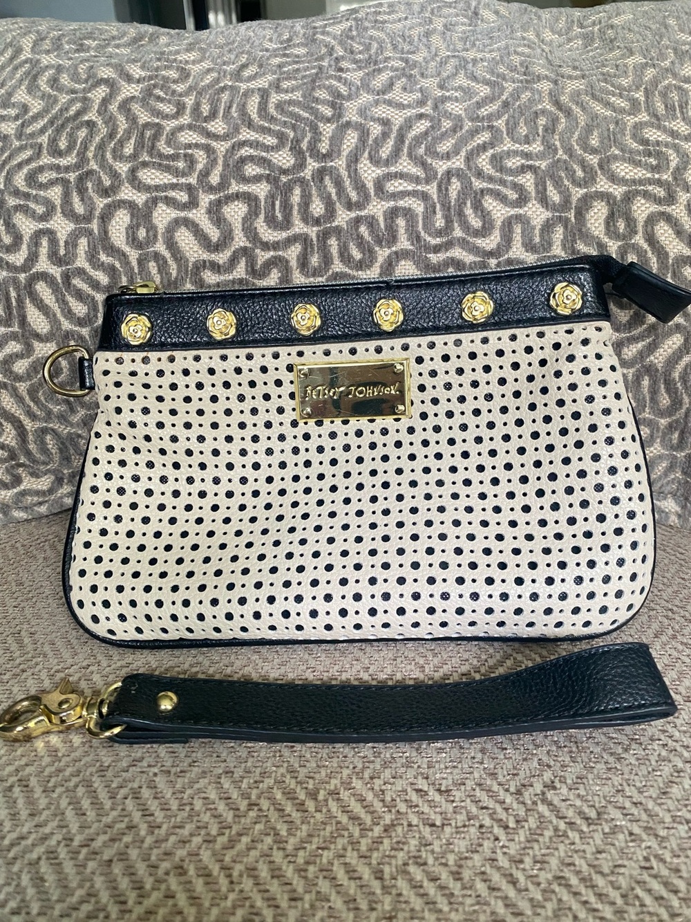 Betsey Johnson Cream & Black Perforated Wristlet with Gold Accents